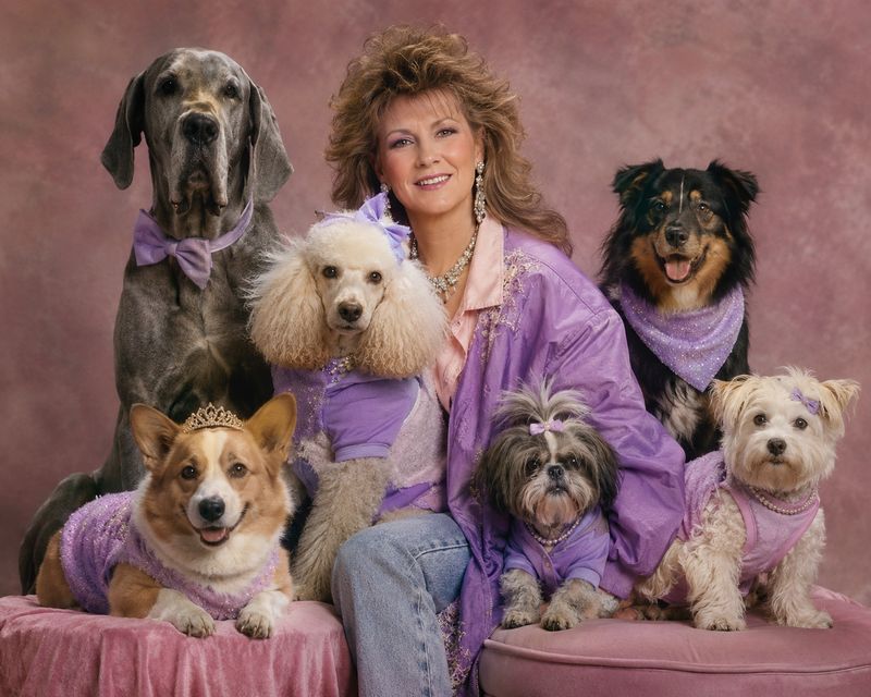Dog mom and six dogs in matching outfits