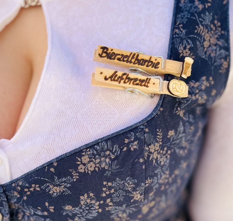 Glupperl - Customized clothespins used as name tags.